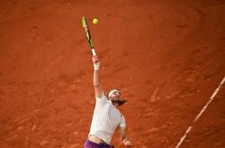 爱游戏tv-意大利网球队鏖战美国网球队，西西帕斯爆发神勇